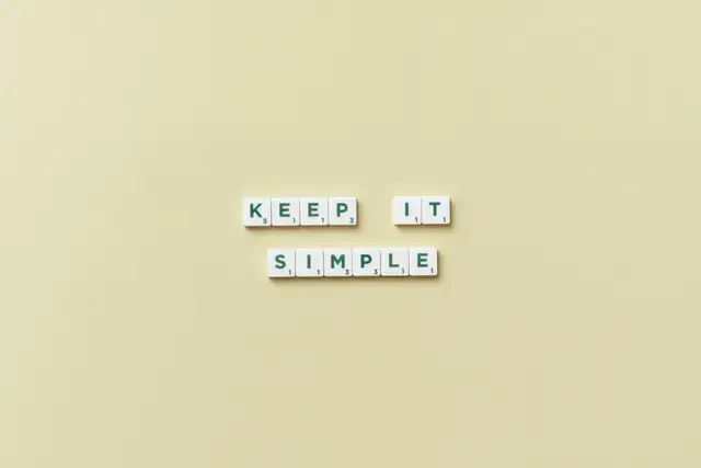 Scrabble pieces that spell 'Keep it Simple'